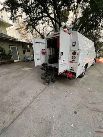 Magnet Plumbing service vehicle on-site for Grease Trap Cleaning in Jacksonville
